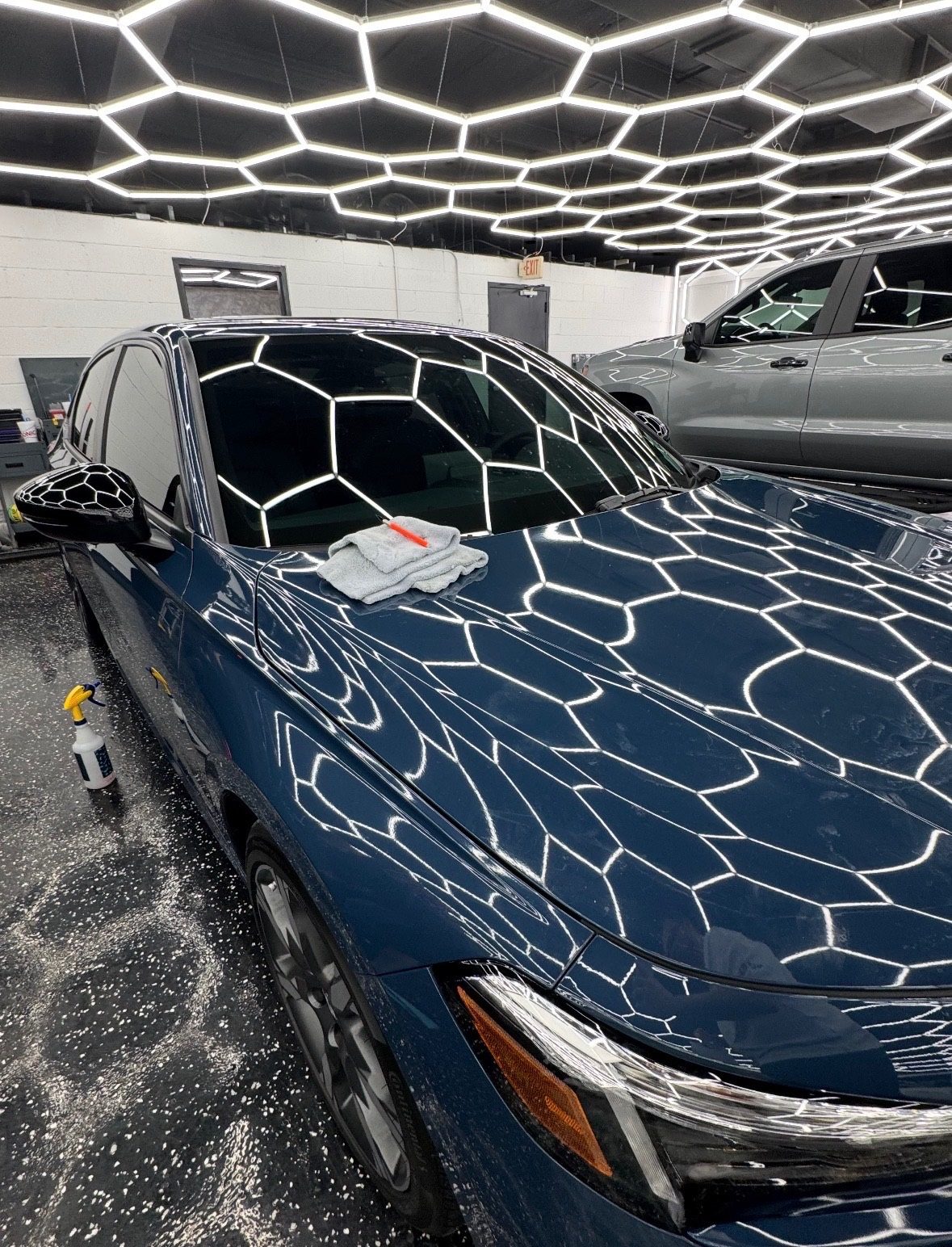 Navy blue SUV ceramic tint at Sleepr Studio College Station TX