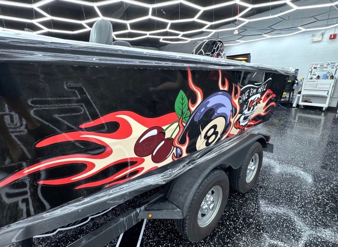 Custom boat vinyl wrap with flames and 8-ball graphic design — Sleepr Studio College Station TX