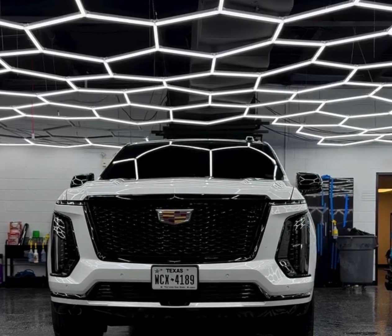 White Cadillac Escalade window tint front view at Sleepr Studio College Station TX
